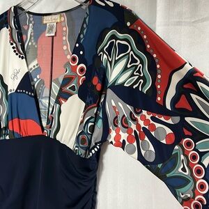 Baby Phat adorable top! Size large (but it’s tight on me & im a medium)